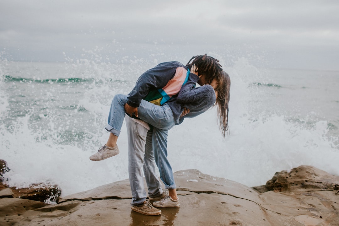 a man and a woman are looking at each other