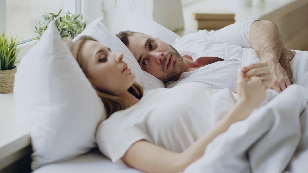 a man and a woman are looking at each other